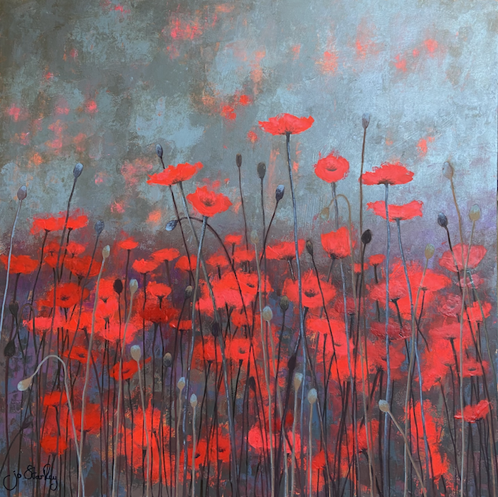 Red poppies against grey backdrop