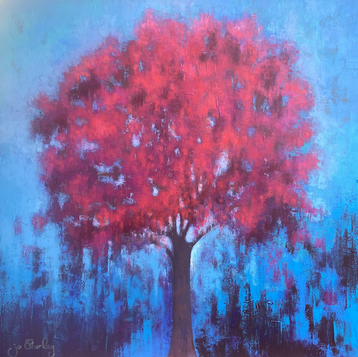 Pink abstract tree against blue backdrop